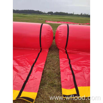 Inflatable flood tube wall barrier for flood control